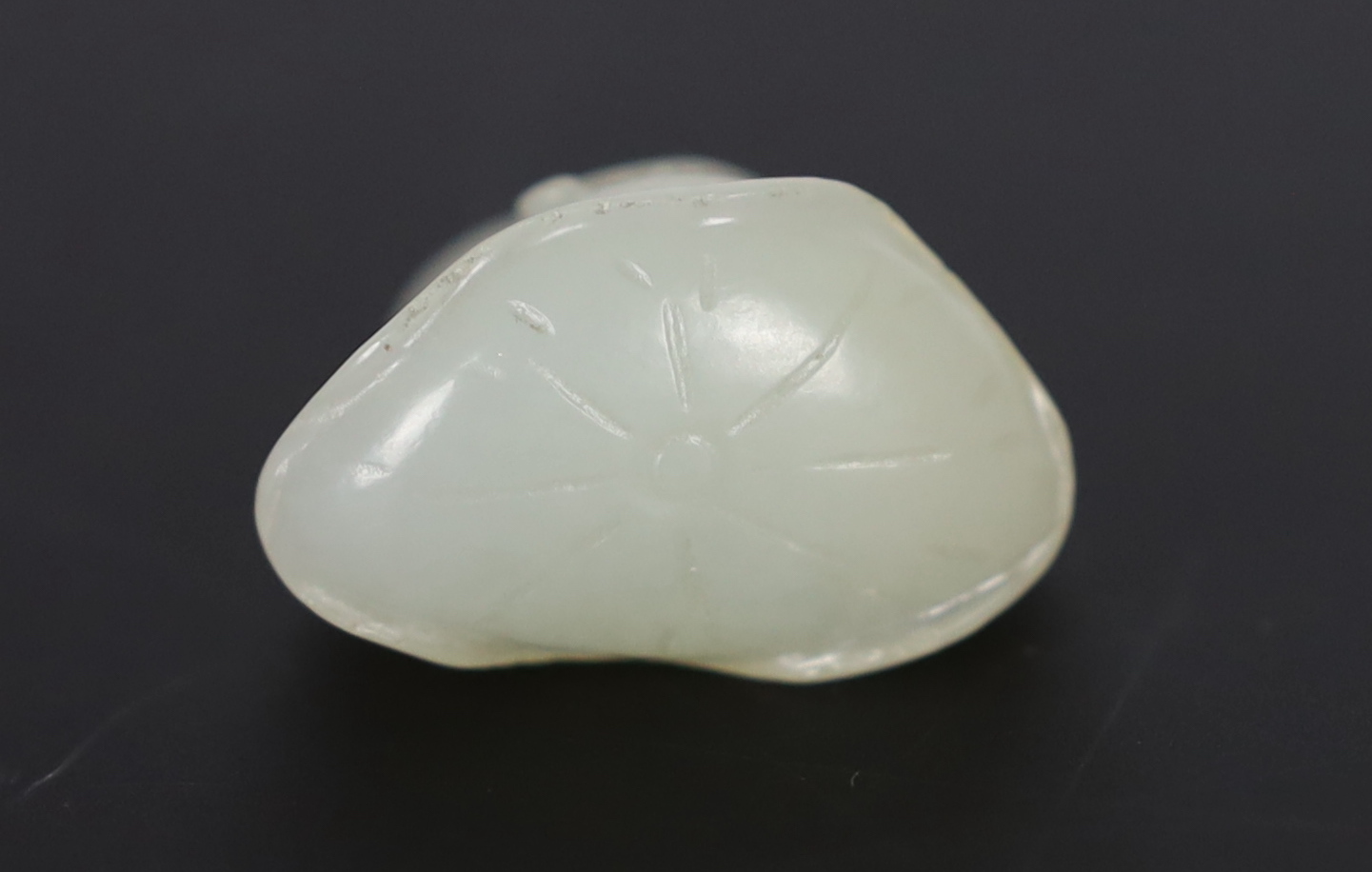 A Chinese small white jade carving of a stylised duck, late Qing dynasty